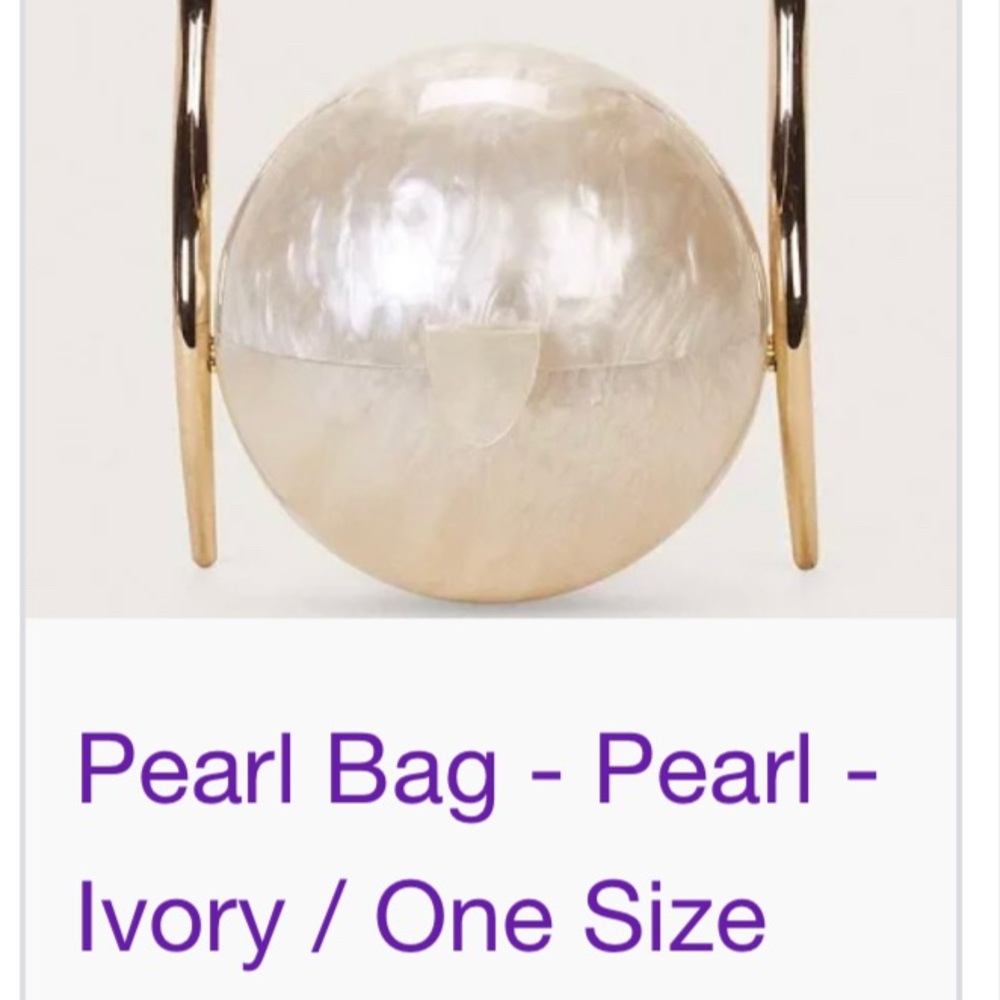 ORIGINAL!! New in box with tag peral top handle purse.